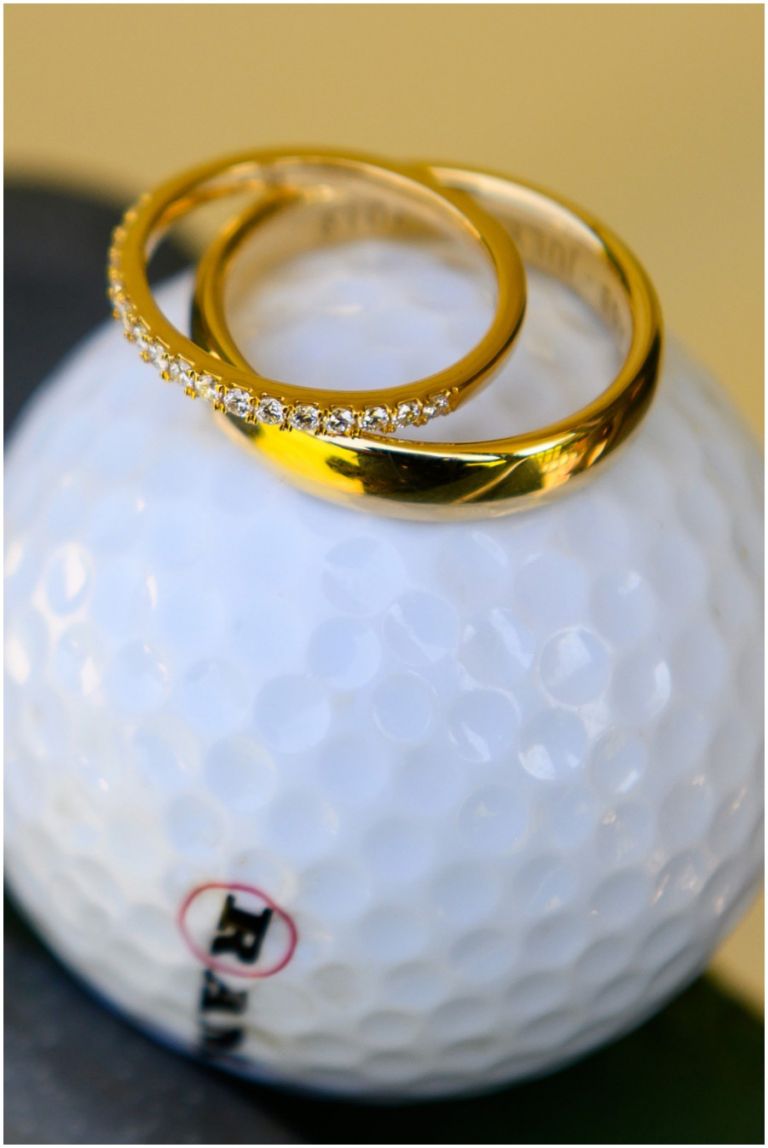 Wedding rings on golf ball at The Oaks by Melissa Grimes-Guy Photography